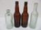 Four Waukesha beer and soda bottles, 7