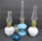 Four miniature oil lamps, 4