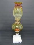 Federal style oil lamp with yellow to orange coloration and milk glass base, 16