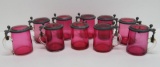 10 Cranberry glass covered steins, 4