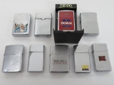 Nine vintage lighters, 8 Zippo