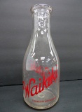 One Quart red pyro milk bottle, Waikiki Dairy