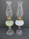 Two Art glass oil lamps, 16