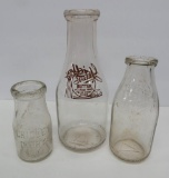 Three Gridley milk bottles, quart, pint and half pint