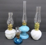 Four miniature oil lamps, 4