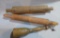 Two early one piece wooden rolling pins and wooden masher