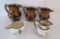 Five pieces of Copper Lustre Pitchers