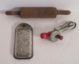 Three miniature kitchen utensils