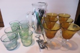 Art Glass cocktail glasses and pitcher with swizzles