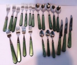 22 pieces of green handled flatware, France, 18/10, stainless