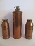 Three copper thermos containers