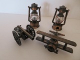 Four metal pencil sharpeners, plane, lantern and cannon, 3