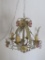 Metal floral chandelier with glass prisms, working