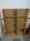 Two wooden display / book shelves