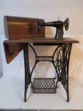 Singer Treadle Sewing machine with box cover and cast iron base