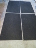 Four 3' x 5' door mats, used