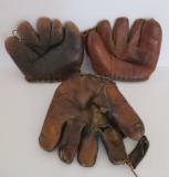 Three Vintage Baseball Gloves