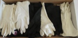 17 pair of white and black ladies gloves