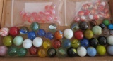 About 70+ machine made marbles