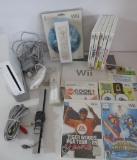 Wii game console with controllers and games