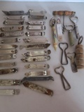 Over 30 Vintage bottle openers