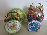 Four Novelty Alarm clocks including Kermit the Frog and Cinderella