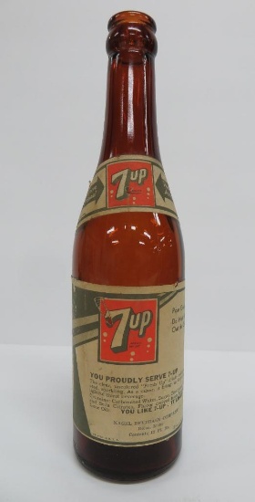 You Proudly Serve 7-UP amber bottle, 12 oz, 1939