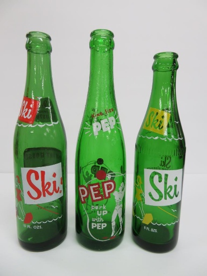 Three green bottles with ACL interesting labels, Ski and PEP