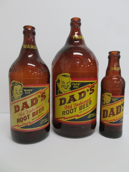 Three amber Dads Old Fashioned Root Beer Bottles, Mama-Papa-Junior