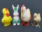 Four plastic Easter collectibles, chicks and rabbit