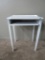 Painted desk table with applied decoration