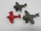 Three metal toy airplanes