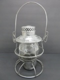 NYC & St L RR lantern with embossed shade and marked frame