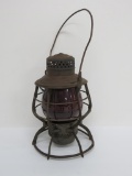NY NH & H Railroad lantern with ruby glass marked C & NW, 10 1/2