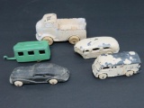 Five vintage metal toys, milk trucks and campers