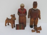 Vintage wood carvings, dogs and people