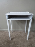 Painted desk table with applied decoration