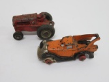 Two Cast iron toys, tractor and wrecker truck