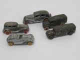 Five metal toy cars and trucks