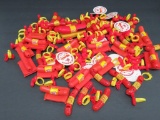 About 131 pieces of Oscar Mayer premiums, rings, whistles and tokens