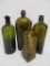Four old olive green and yellow green bottles, 8