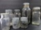 Seven vintage clear canning jars, 1/2 gallon, quart and 1/2 pint