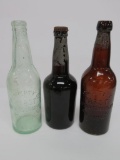 Vintage Pabst bottles, amber and aqua