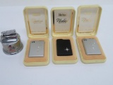 Four Vintage Lighters, musical and table top