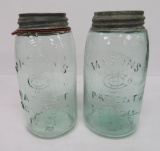 Two Mason quart fruit jars, Consolidated Fruit Jar co logo, green