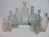 16 Assorted bottles, aqua and clear, 2 1/2