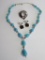 Beaded blue necklace, clip on earrings and scarf/pin