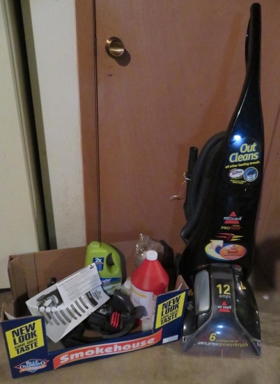 12 Amp Bissell Carpet Cleaner with cleaning supplies