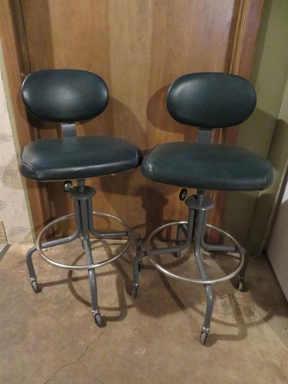 Two swivel adjustable task stools