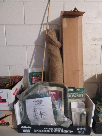 Gardening lot with Veggie Cages, netting and greenhouse umbrellas